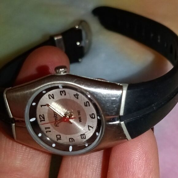 Ladies Armitron with a black rubber band and round silver face - Picture 9 of 9